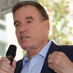 Senator Mark Warner speaks at the grand opening of Queens Court, June 2021